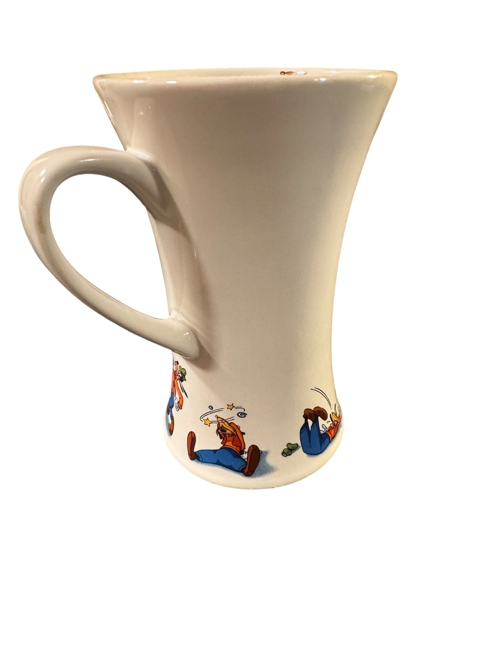 Vintage Disney store Goofy slipping on a banana peel.